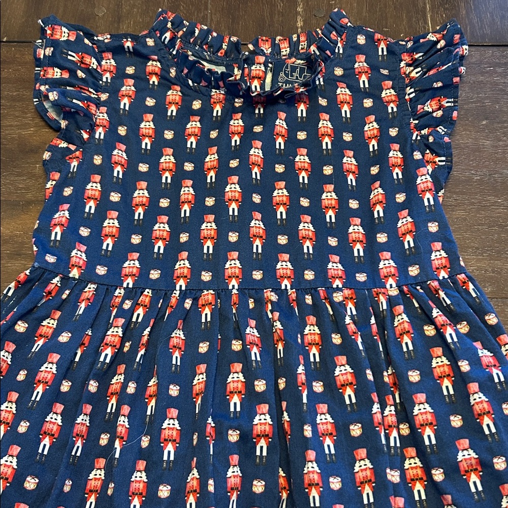 TUKTUK Designs Navy with Christmas Nutcrackers Ruffle Sleeve Cotton Dress